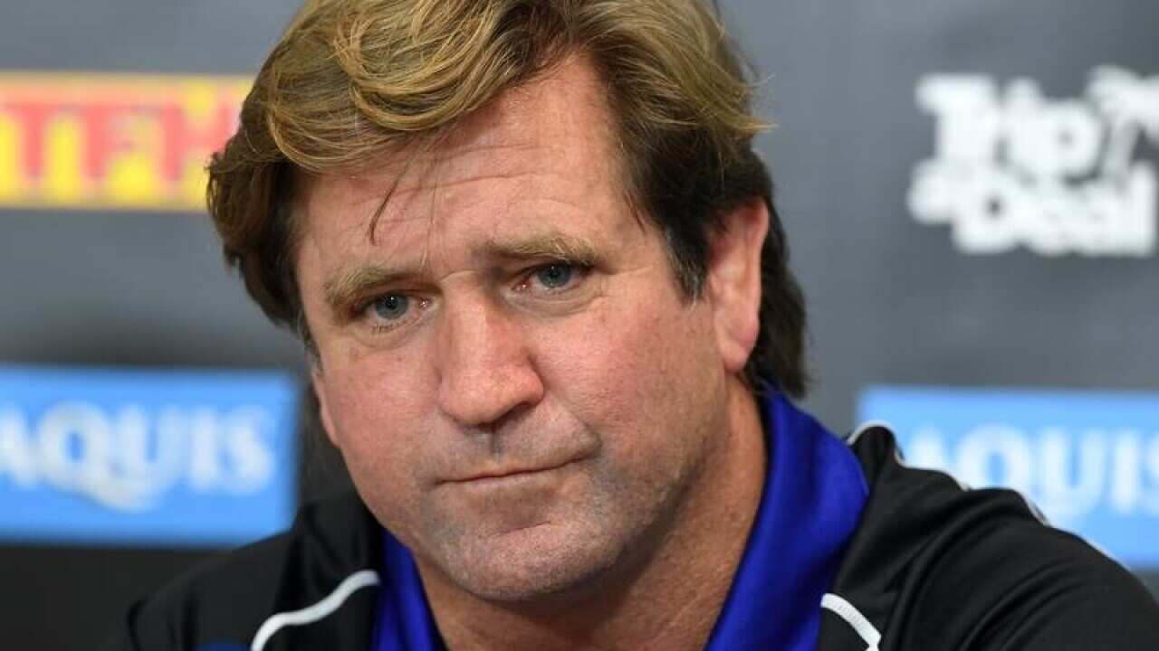 A file image of Des Hasler looking on during a press conference