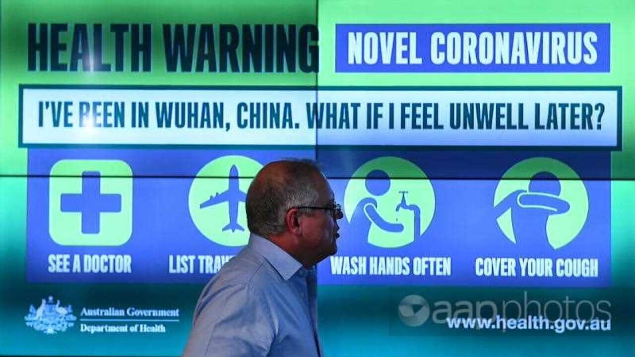Prime Minister Scott Morrison is updated on the steps being taken to control the coronavirus at the National Incident Room (Department of Health in Canberra)