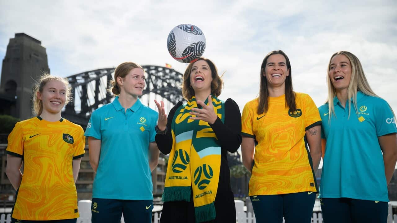 Federal Sport Minister Anika Wells along with Matildas players during a Football Australia announcement.