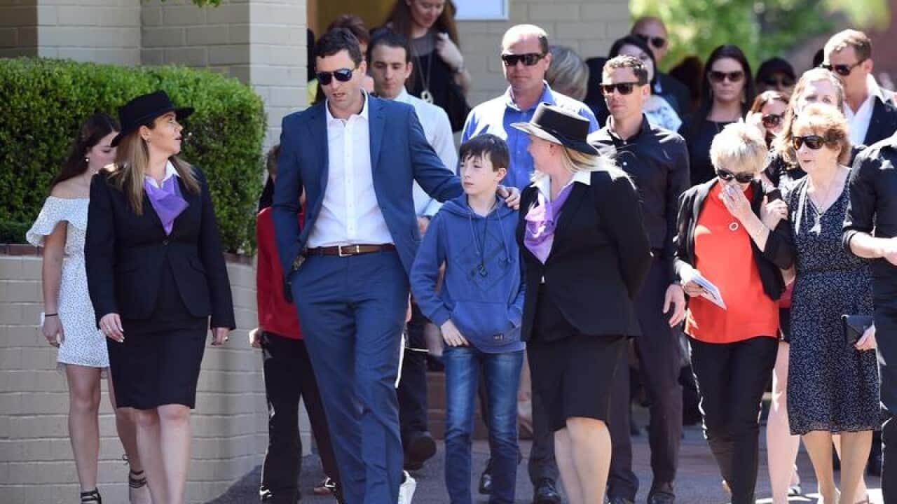 Mathew Low at the funeral of his wife, Dreamworld victim, Cindy.