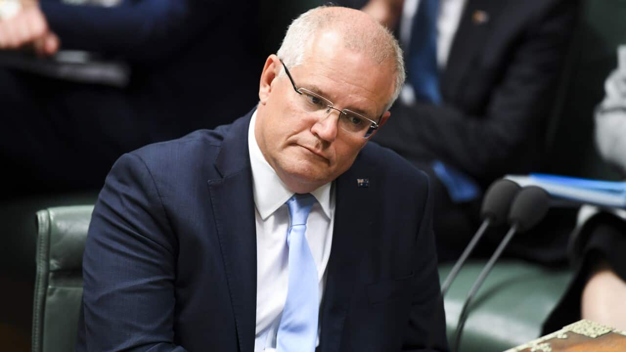 Australian Prime Minister Scott Morrison reacts during House of Representatives Question Time at Parliament House in Canberra, Tuesday, 2 April 2019. (AAP Image/Lukas Coch) NO ARCHIVING