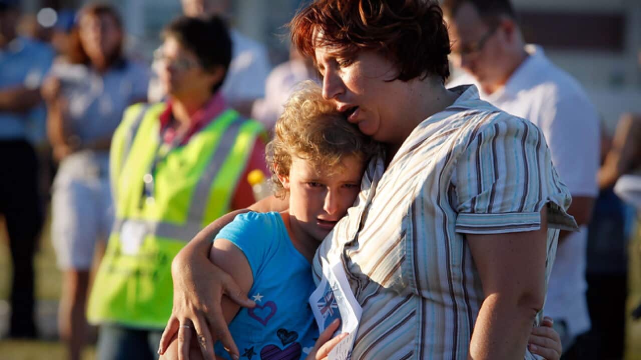 flood_woman_L_110128_aap_129799713