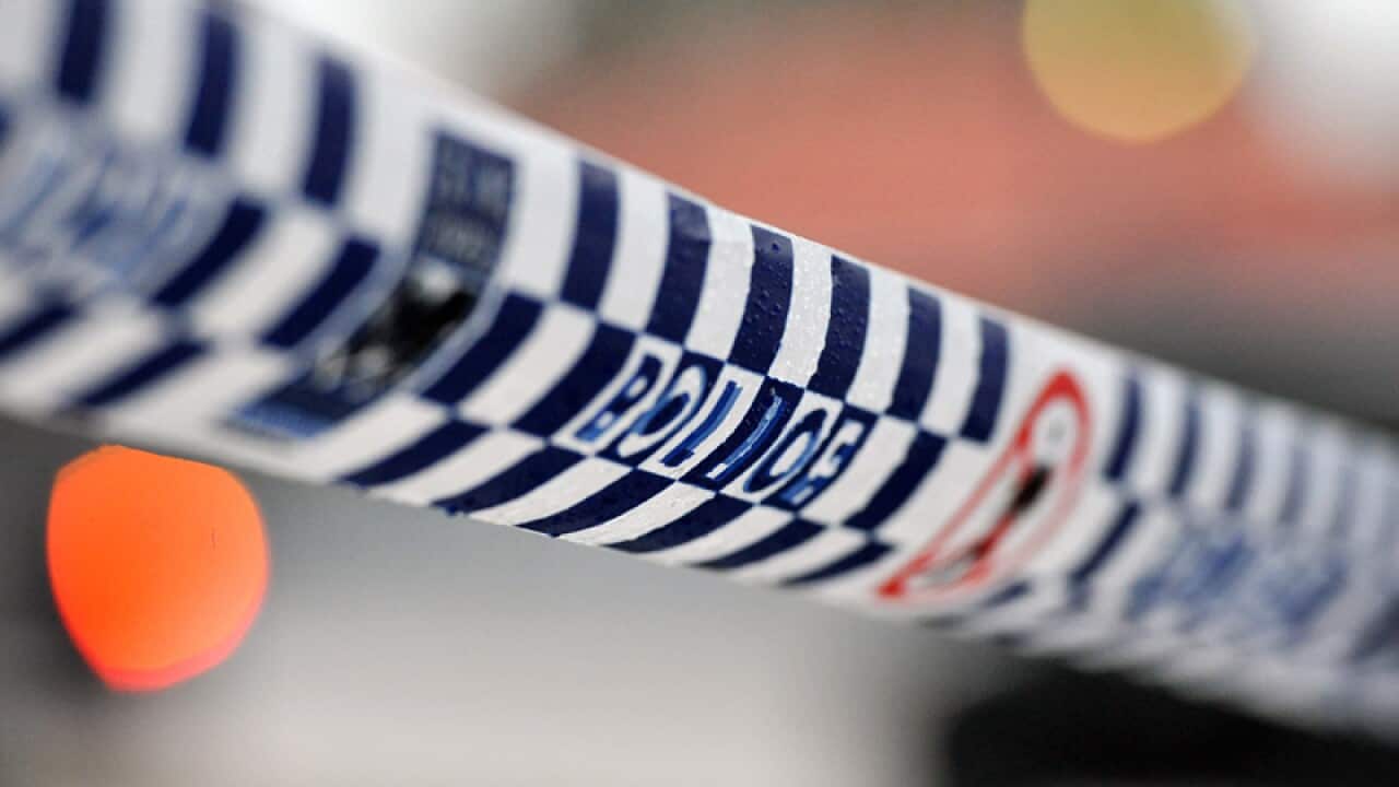 Police tape restricts access to a crime scene, Sydney