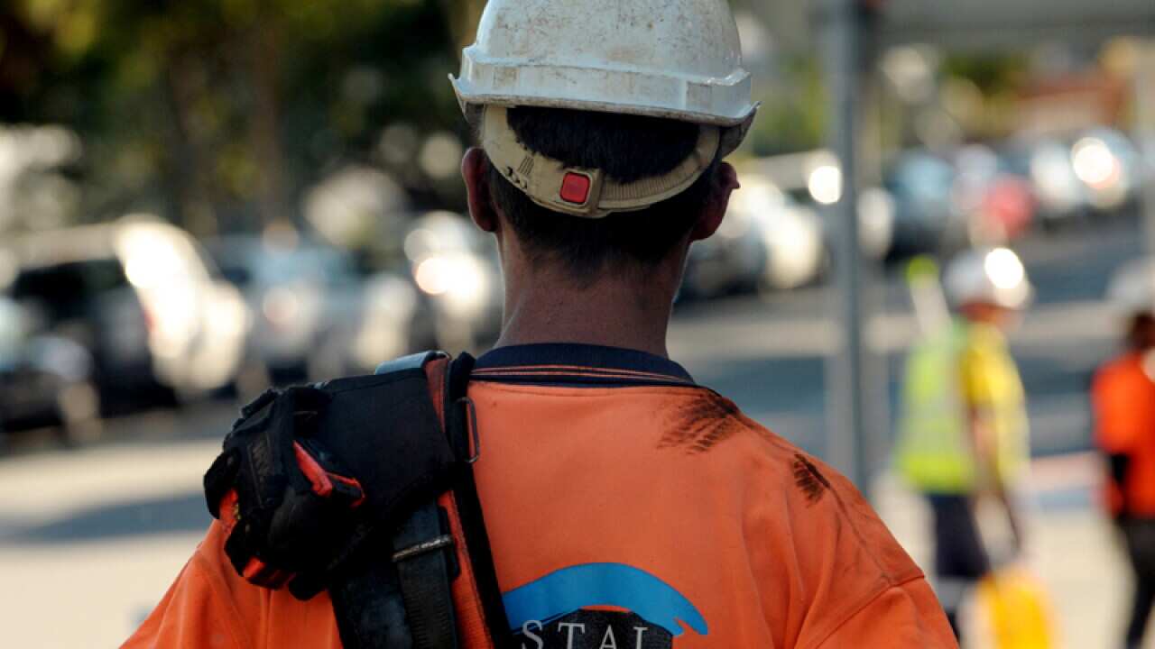 A construction worker at a building site in Brisbane