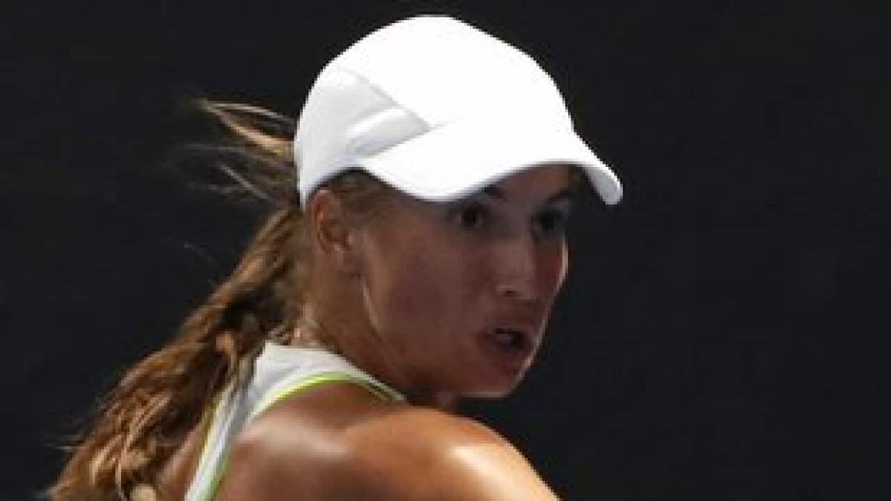 Kazakstan's Yulia Putintseva reaches for a return to Britain's Heather Watson during their first round match at the Australian Open tennis championships in Melbourne, Australia, Tuesday, Jan. 16, 2018. (AP Photo/Ng Han Guan)