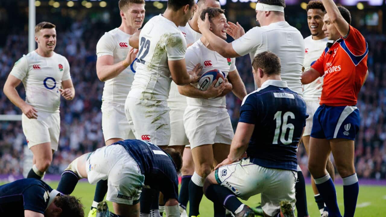 England's Danny Care (C) celebrates after scoring a try