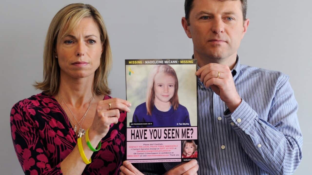 A file photograph dated 02 May 2012 shows Kate (L) and Gerry McCann (R) holding an age-progressed police image of their daughter Madeleine 