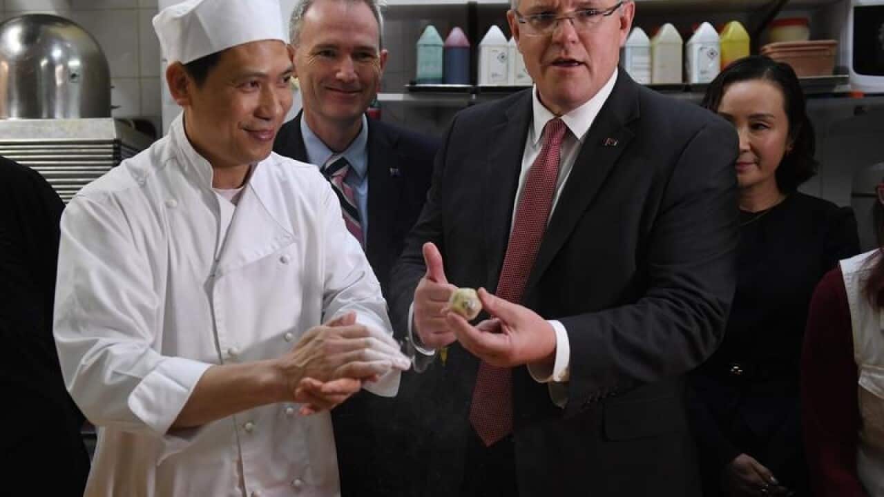 Australian Prime Minister Scott Morrison (right)
