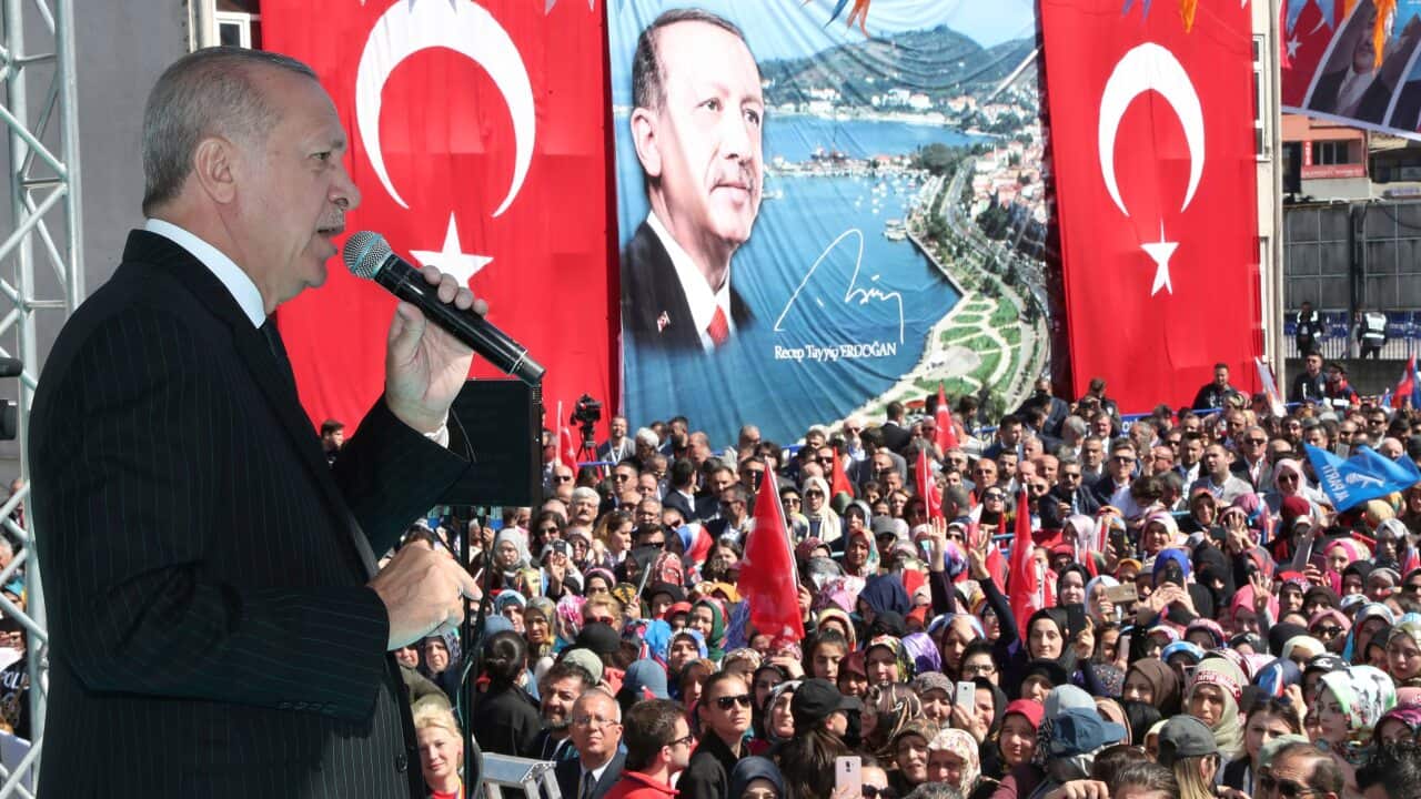 Turkey's President Recep Tayyip Erdogan addresses the supporters of his ruling Justice and Development Party during a rally in Eregli, Turkey.