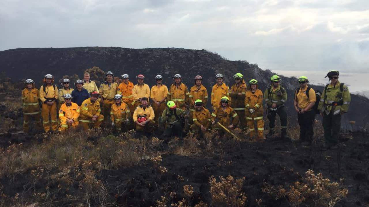 NSW and ACT remote area crews at Strathgordon fire in Tasmania (@NSWRFS)