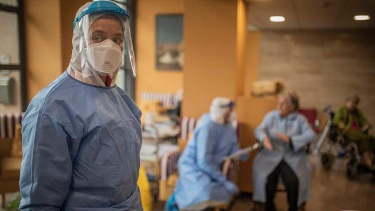 Aid workers from the Spanish NGO Open Arms carry out coronavirus detection tests on the elderly at a nursing home in Barcelona, Spain.