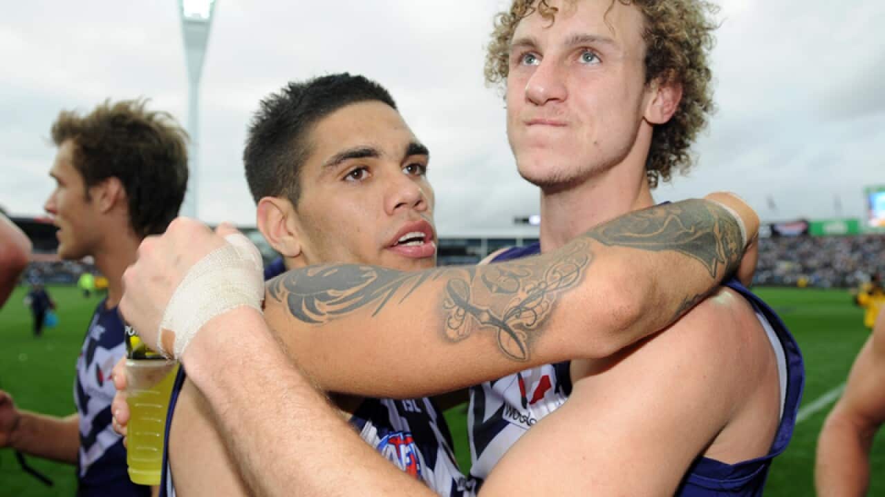 Fremantle players celebrate after their match