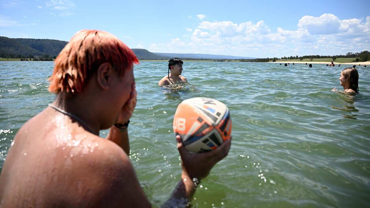 Beachgoers at Penrith Beach, Sydney on Tuesday, December 17, 2024.