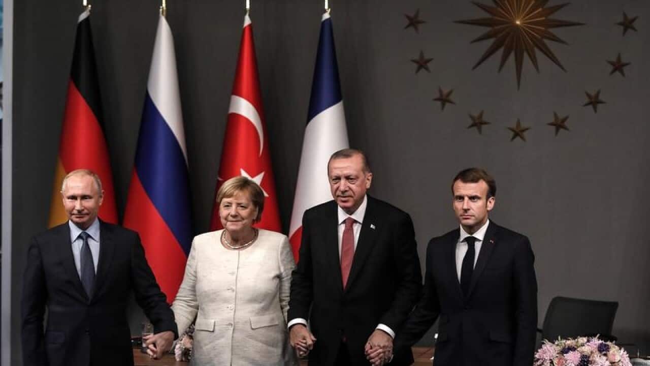 The four leaders after their summit in Istanbul