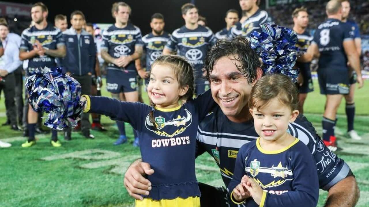 Johnathan Thurston co-captain of the Cowboys with his children.