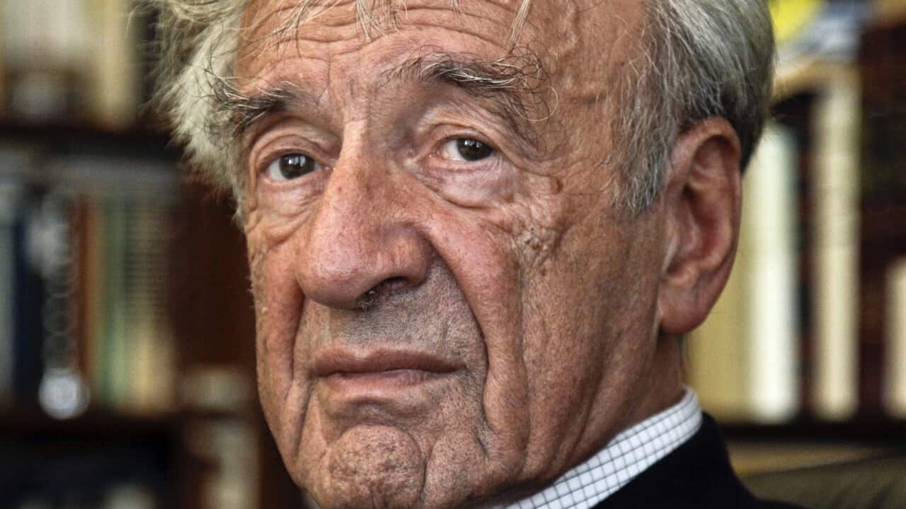 FILE - In this Sept. 12, 2012, photo Elie Wiesel is photographed in his office in New York. Israel's Yad Vashem Holocaust Memorial says Elie Wiesel has died at 87. (AP Photo/Bebeto Matthews)