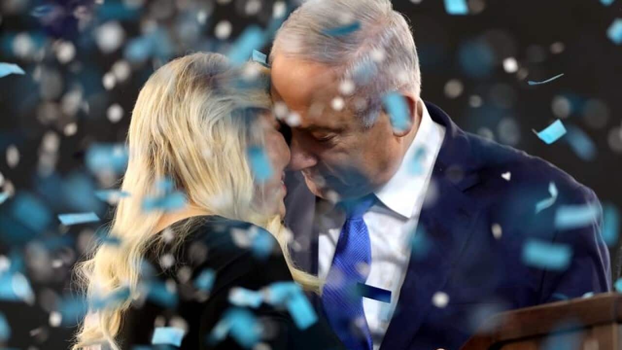 Benjamin Netanyahu and his wife Sara celebrate the election victory