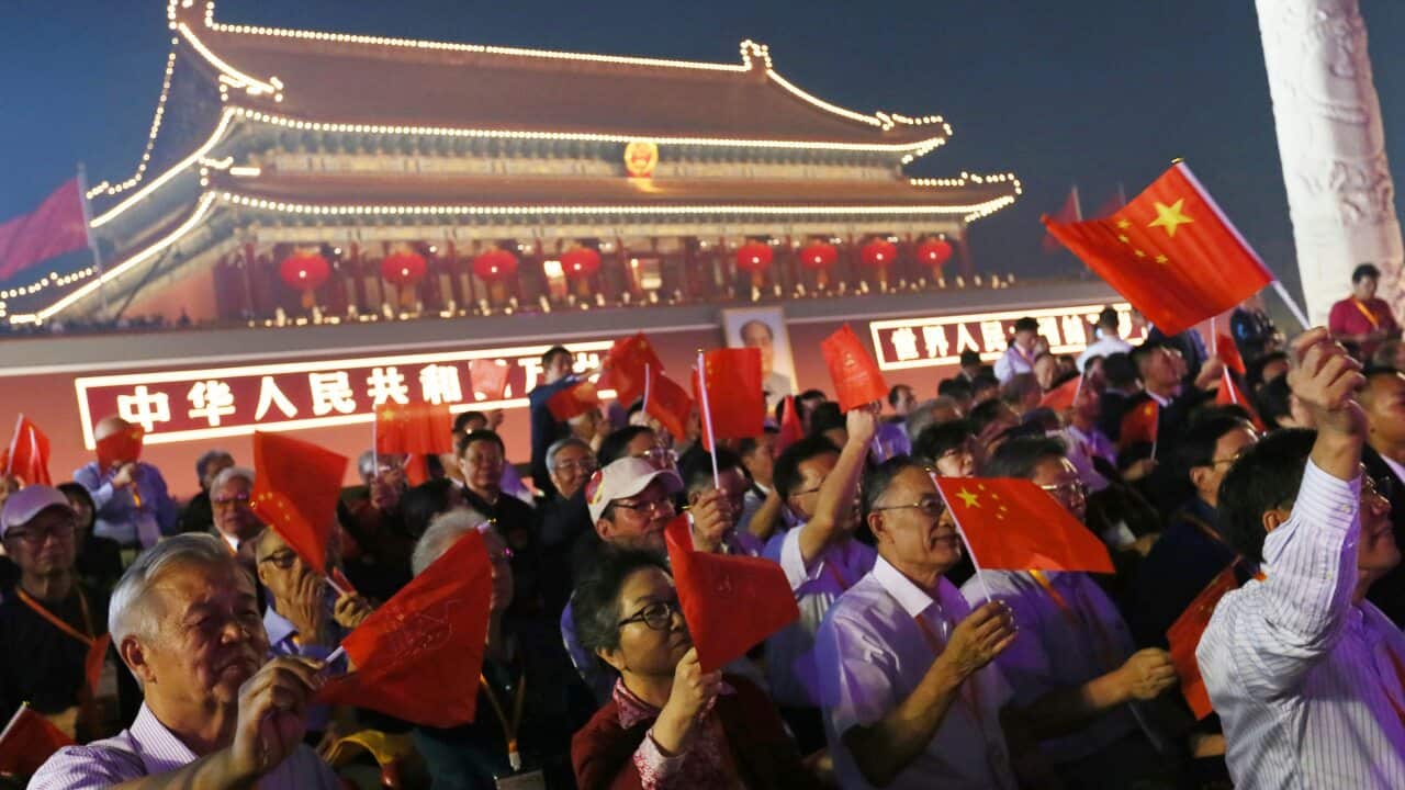 A night show to celebrate the 70th anniversary of the founding of a nation is held at the Tiananmen Square in Beijing, China on October 1, 2019. New weapons were unveiled at the largest military parade ever. ( The Yomiuri Shimbun via AP Images )