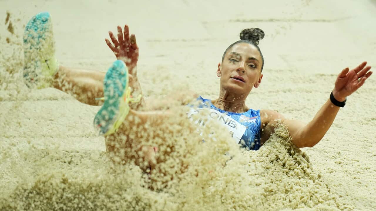 Ivana Vuleta, of Serbia, makes an attempt in the Women's long jump at the World Athletics Indoor Championships in Belgrade, Serbia, Sunday, March 20, 2022. (AP Photo/Petr David Josek)