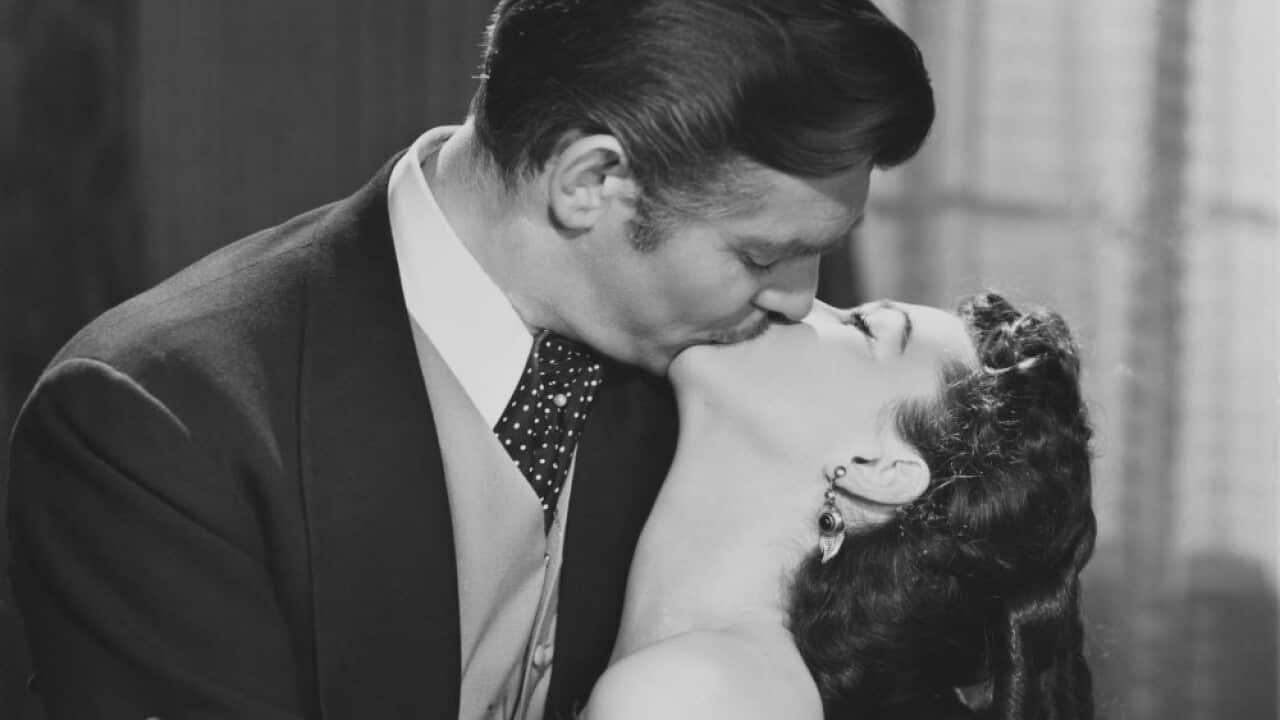 When an adult kisses another on the lips, their heads tend to automatically lean to the right. Is this the result of a genetic bias or something we learn to do?