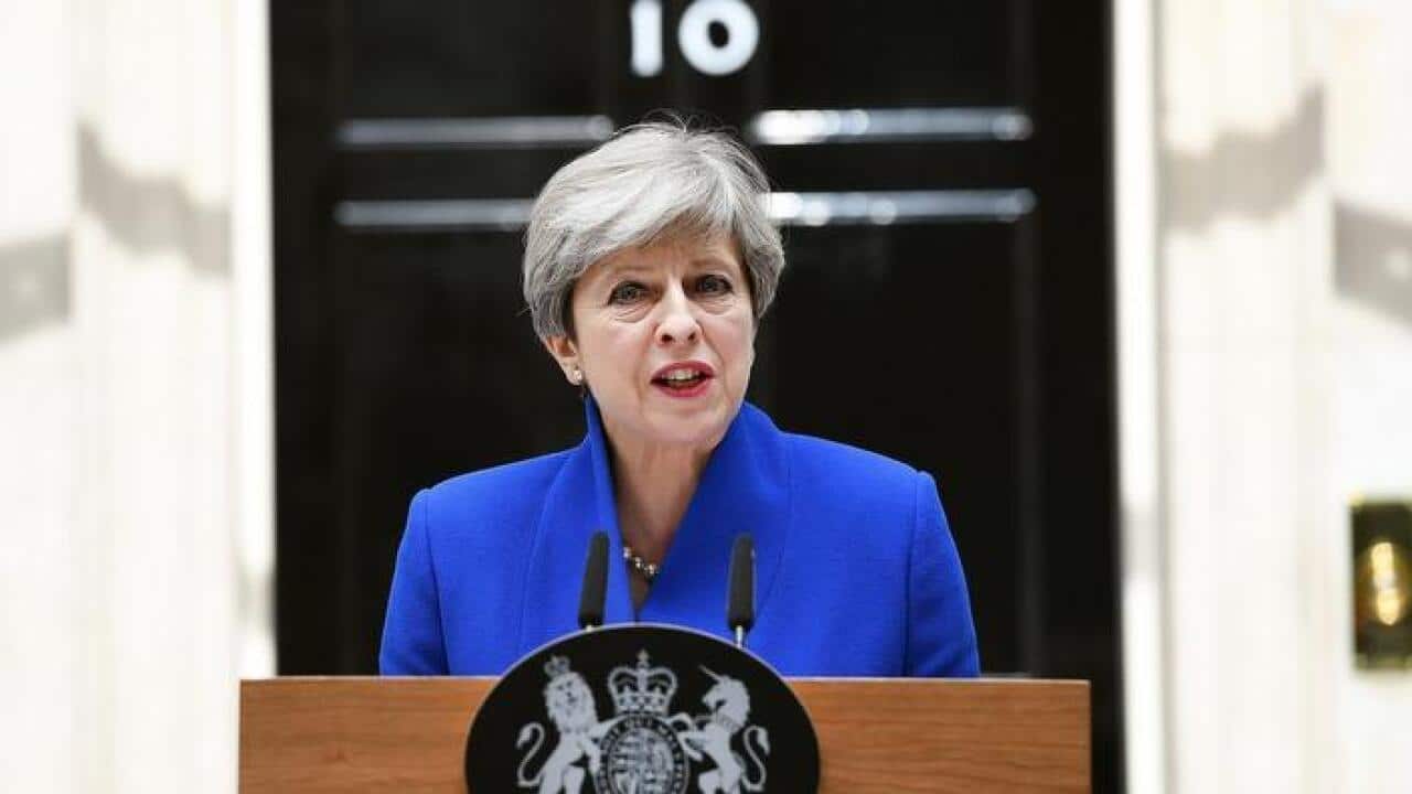 Britain's Prime Minister Theresa May speaking outside No. 10 Downing Street after meeting the Queen in London.