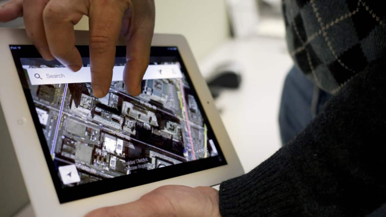 A man demonstrates the Google Maps application