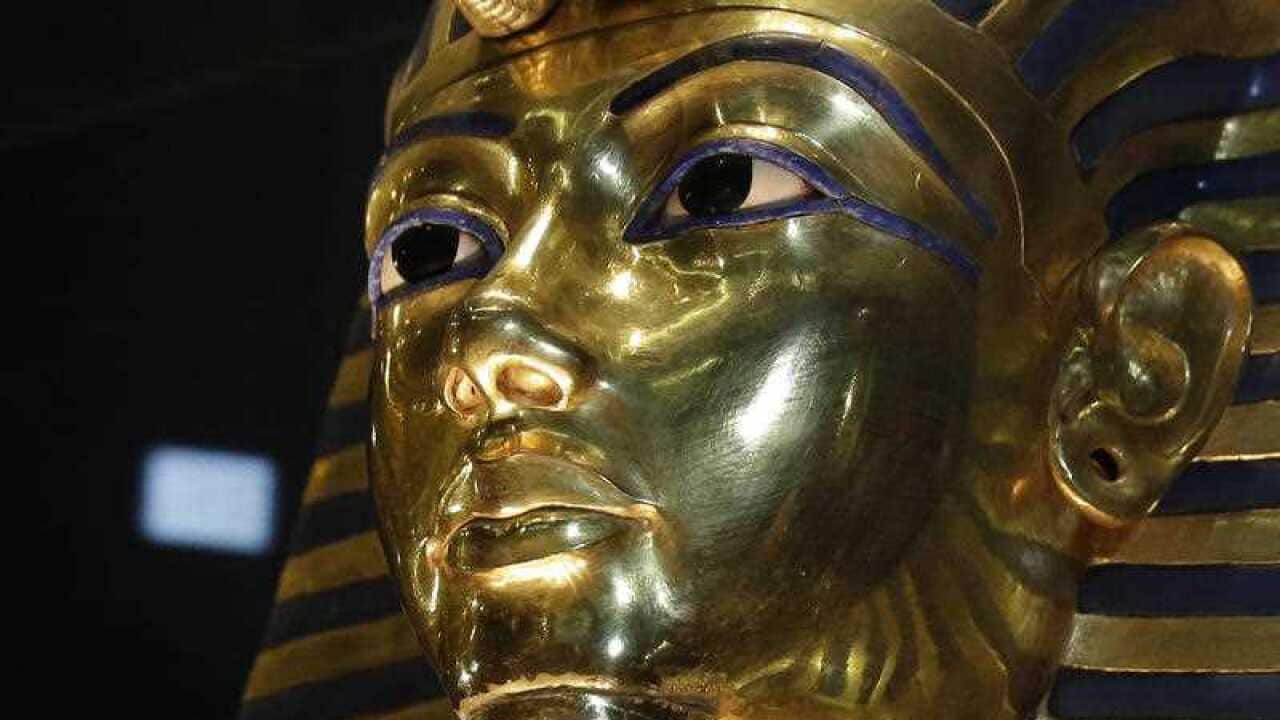 The gold mask of King Tutankhamun is seen in its glass case during a press tour, in the Egyptian Museum near Tahrir Square, Cairo, Egypt, Saturday, Jan. 24, 2015.