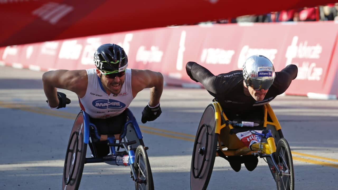 Kurt Fearnley, left, of Australia and Marcel Hug, of Switzerland