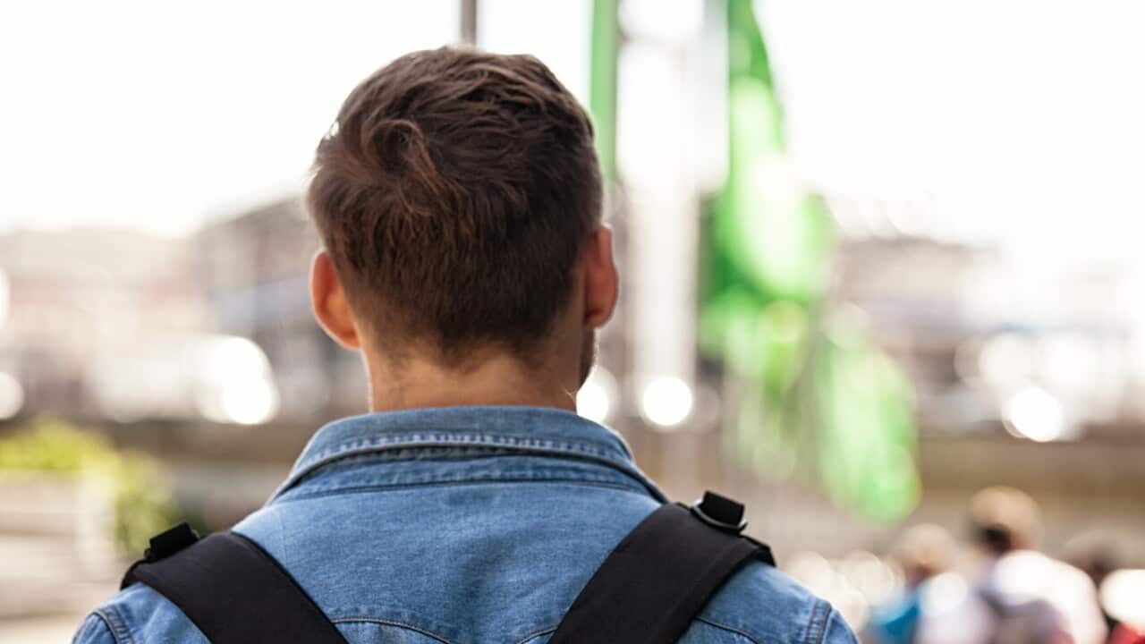 backpacker from behind