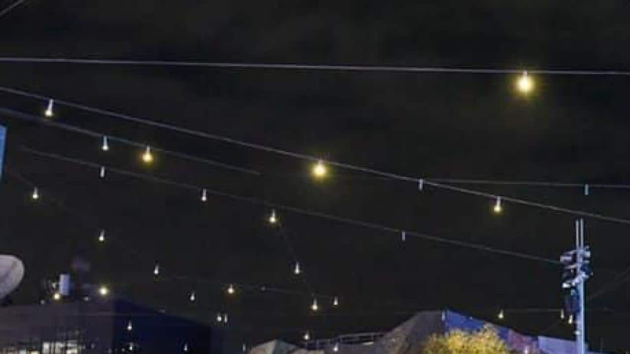 Event organiser Karthik Arasu and other members of Indian Australian community at Fed Square, Melbourne