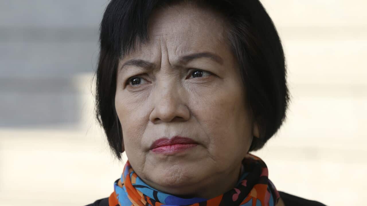The woman, identified by a rights group only as Anchan, at the Criminal Court in Bangkok, Thailand, 19 January 2021.
