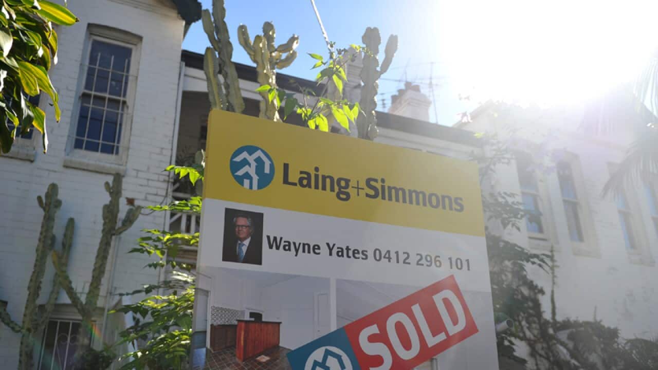 A sold sign on a house.