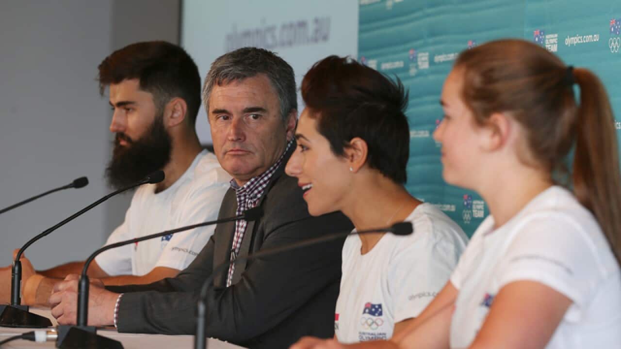 Australia's Winter Olympic team Chef de Mission Ian Chesterman (2L)