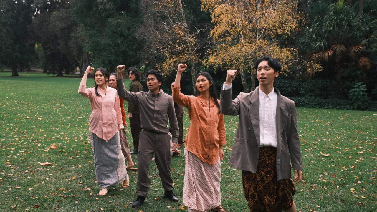 Denzel Tan (R) rehearses as Galih for the Temulawak 2026 production of 'Riuh di Bawah Langit Merah'.