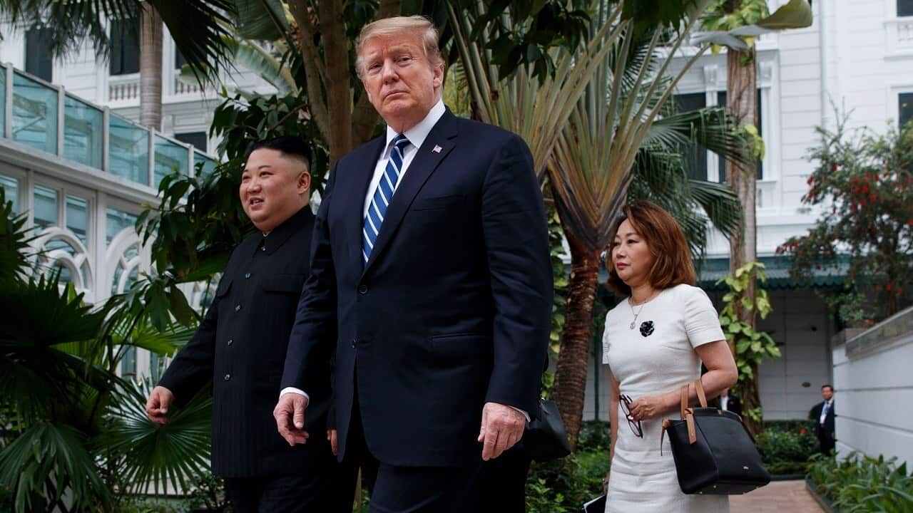 President Donald Trump and North Korean leader Kim Jong Un take a walk at the Sofitel Legend Metropole Hanoi hotel.