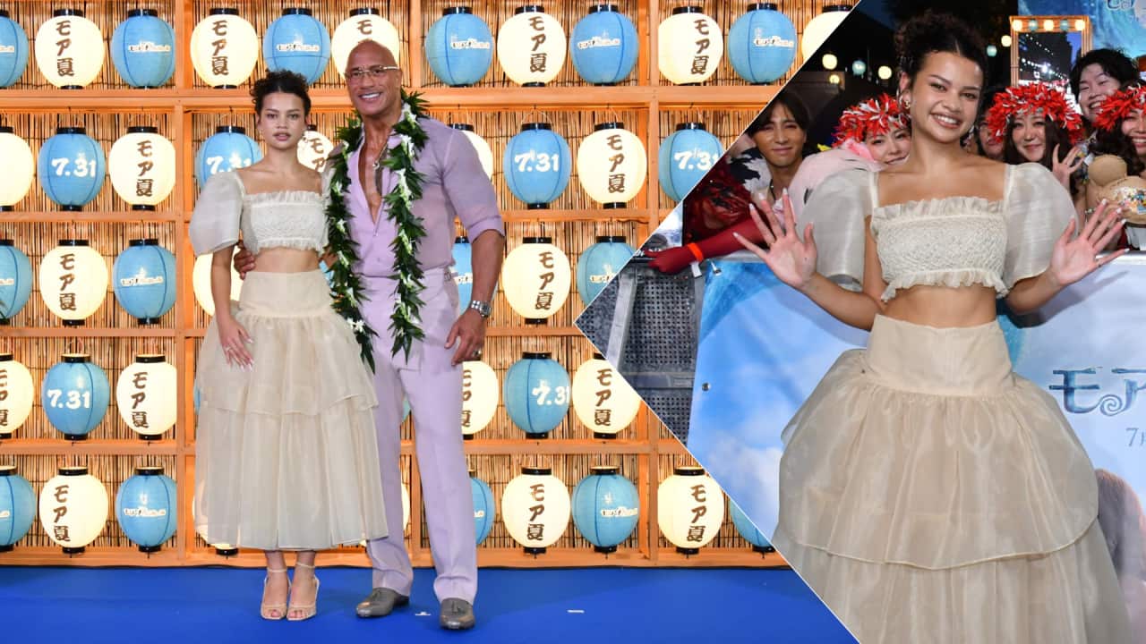 Catherine Laga’aia (pictured with actor Dwayne Johnson) celebrates Filipino fashion after wearing a modern Filipiniana designed by Filipino designer Vania Romoff during the Tokyo press tour for Moana.