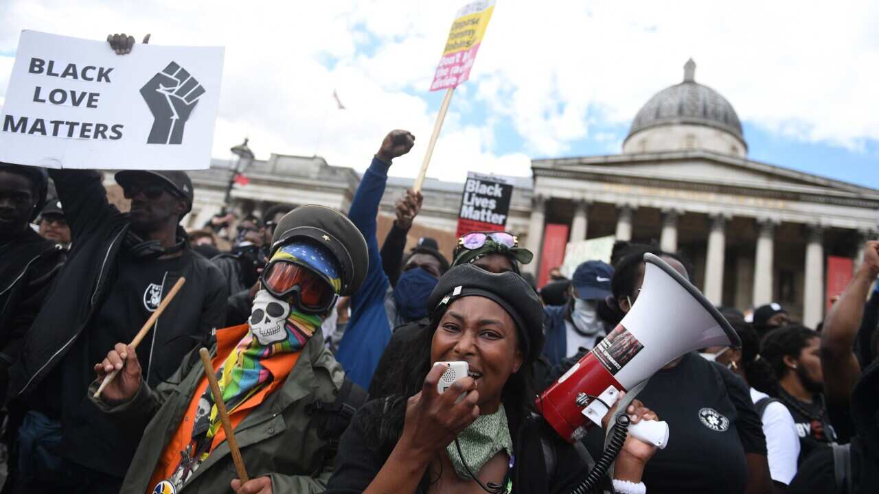 Protesters gather in Trafalgar Square during a Black Lives Matter (BLM) demonstration in London.