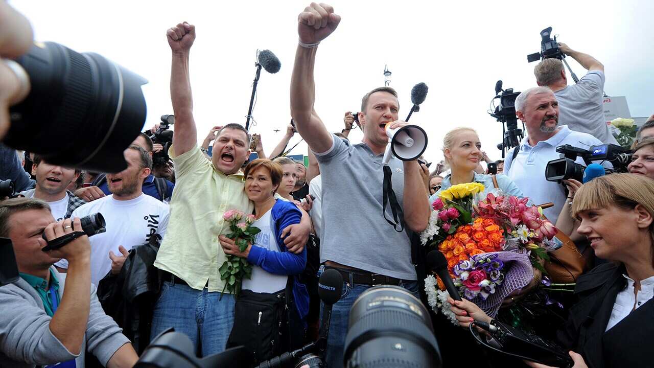 Alexei Navalny (centre) addresses a crowd of anti-Putin protesters. (Getty)