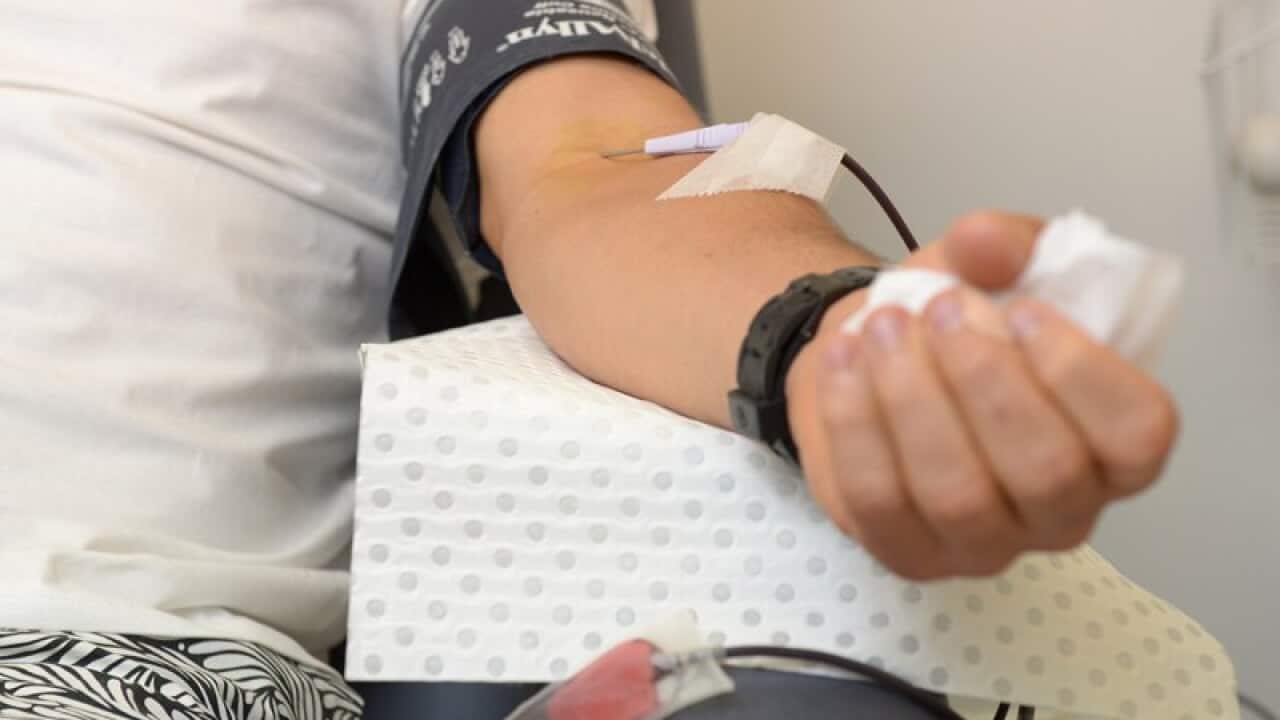 A man donates blood