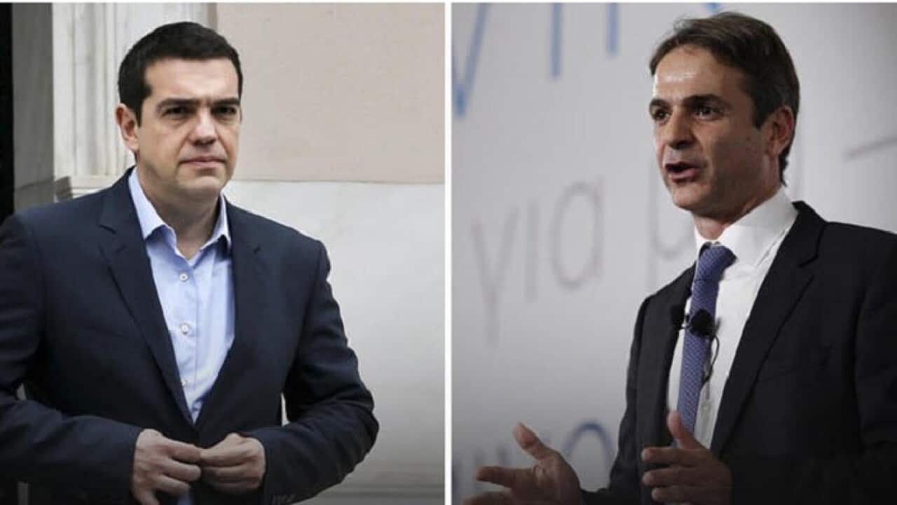 Greek PM Tsipras (L) and Opposition Leader Mitsotakis