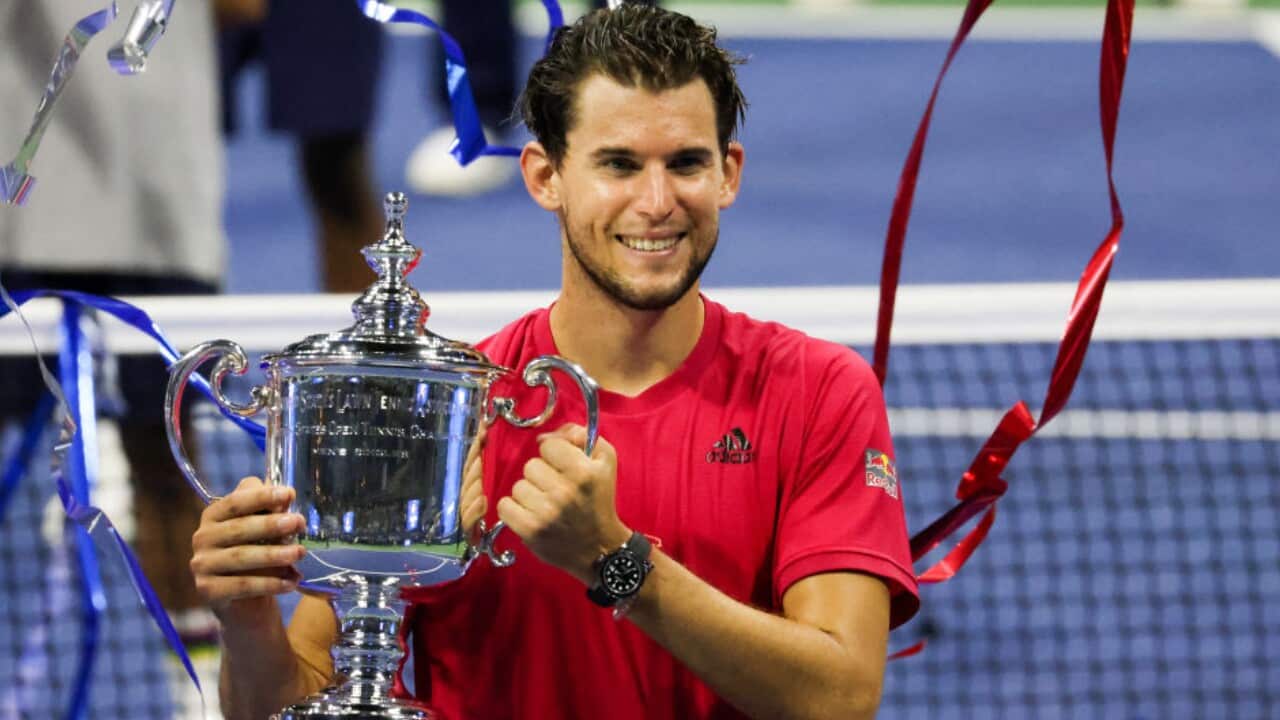 Dominic Thiem celebrates with the US Open trophy