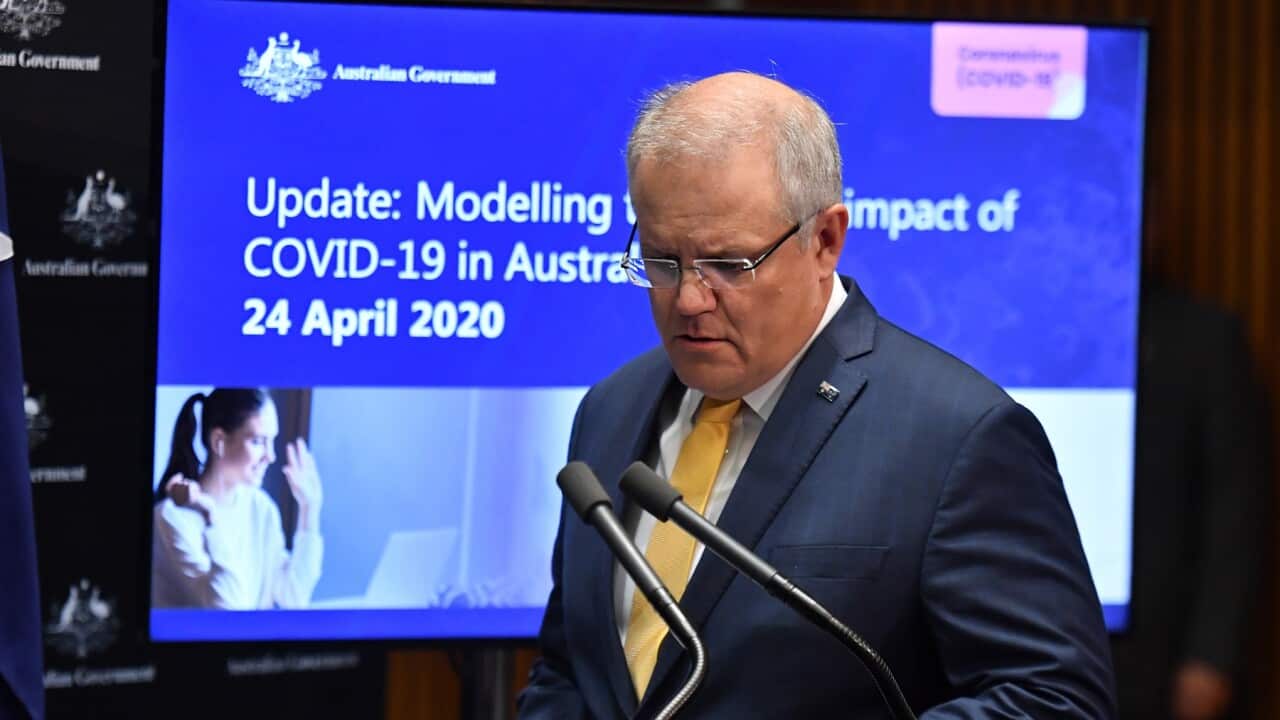Prime Minister Scott Morrison arrives to give a coronavirus update at a press conference at Parliament House in Canberra, Friday, April 24, 2020. (AAP Image/Mick Tsikas) NO ARCHIVING