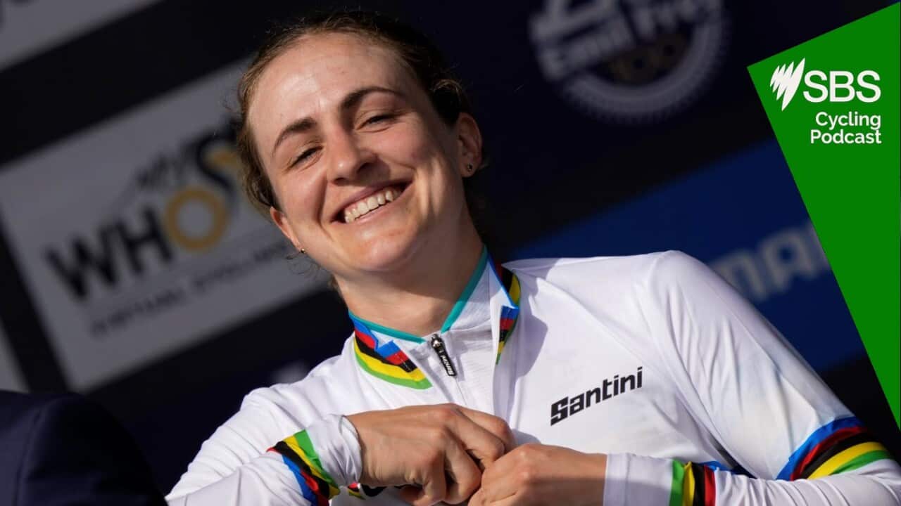 New World Champion Grace Brown of Australia dons the rainbow jersey on the podium after the women elite individual time trial over 29.9 kilometres (18.6 miles) at the Cycling World Championships in Zurich, Switzerland, Sunday, Sept. 22, 2024. (AP Photo/Peter Dejong)