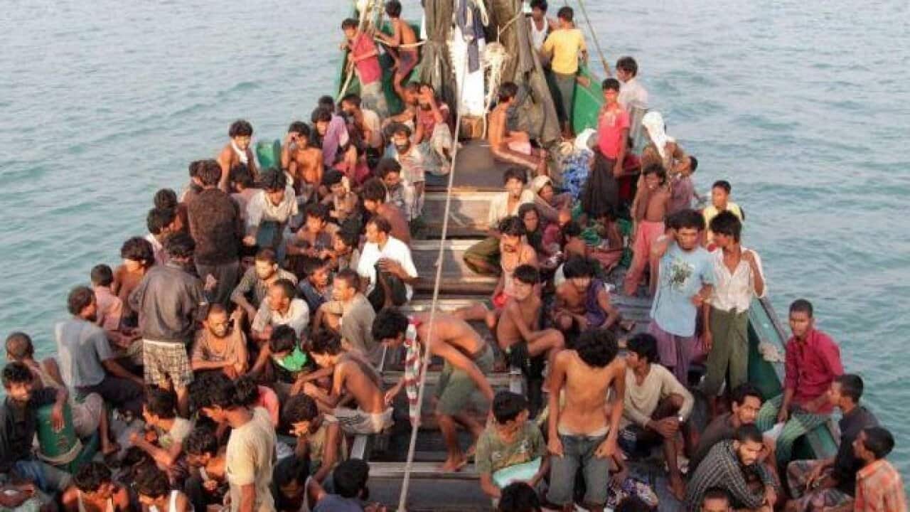 People on a boat in the open sea