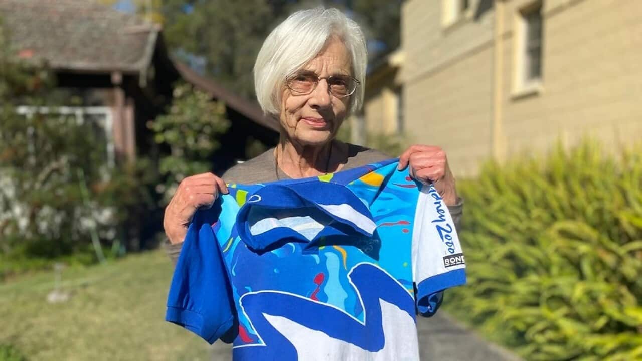 Volunteer Estonian interpreter Vella Pihlak with her Sydney 2000 uniform