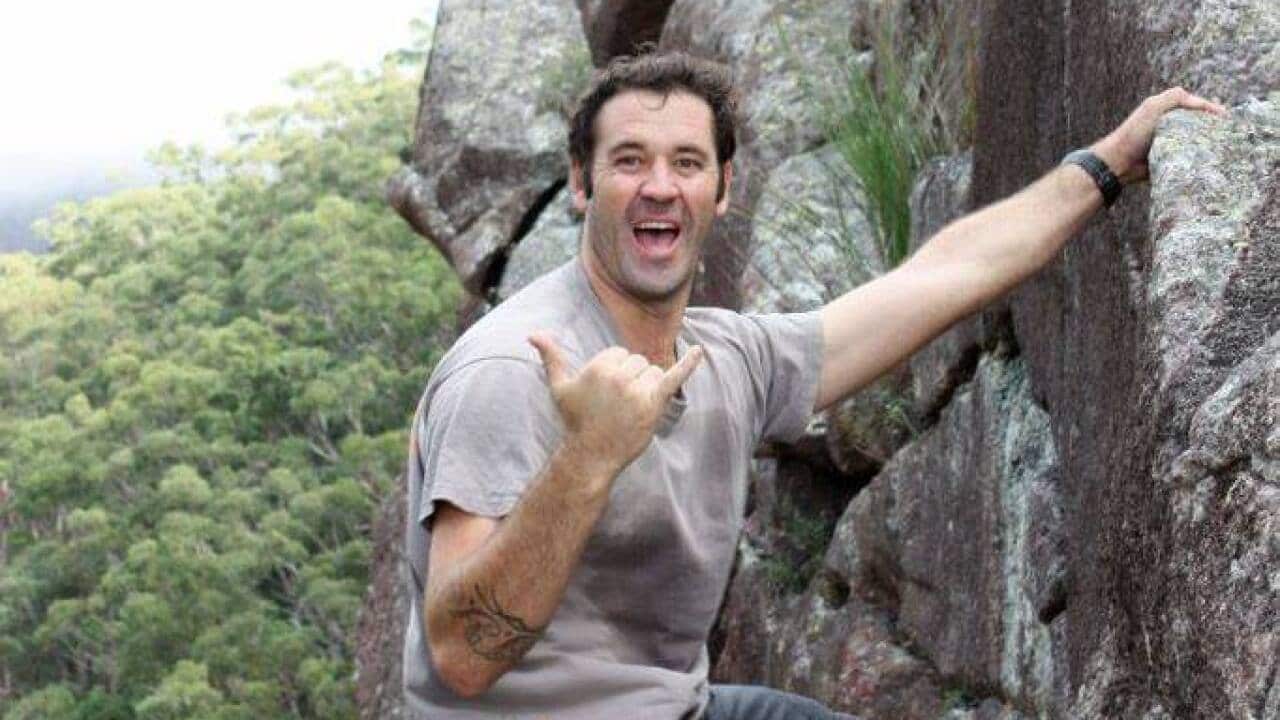 Austin Desi rock climbing