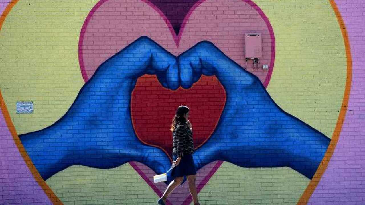 A heart-shaped mural is seen painted near a community services centre in Logan, south of Brisbane.