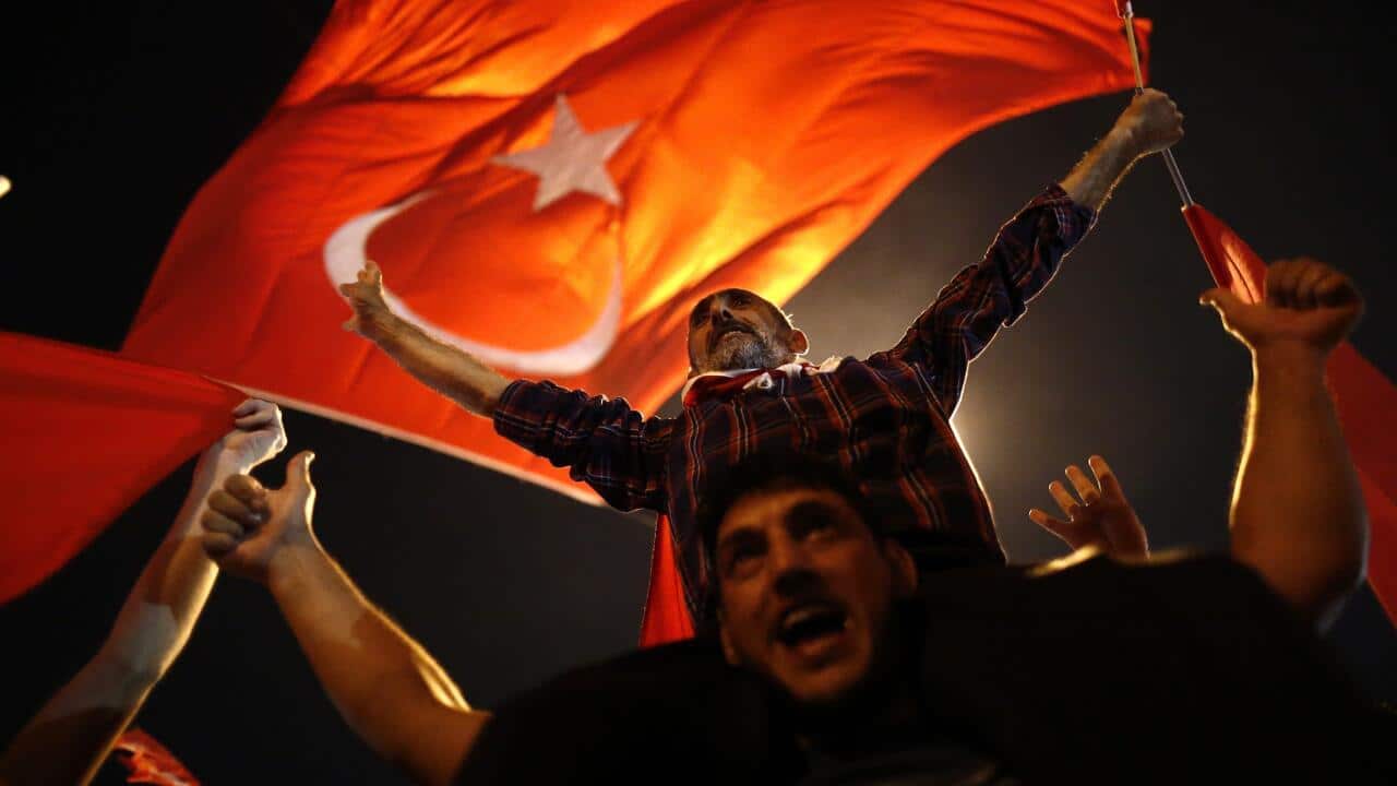 Supporters of Turkish President Recep Tayyip Erdogan celebrate in Istanbul, Turkey (AAP)