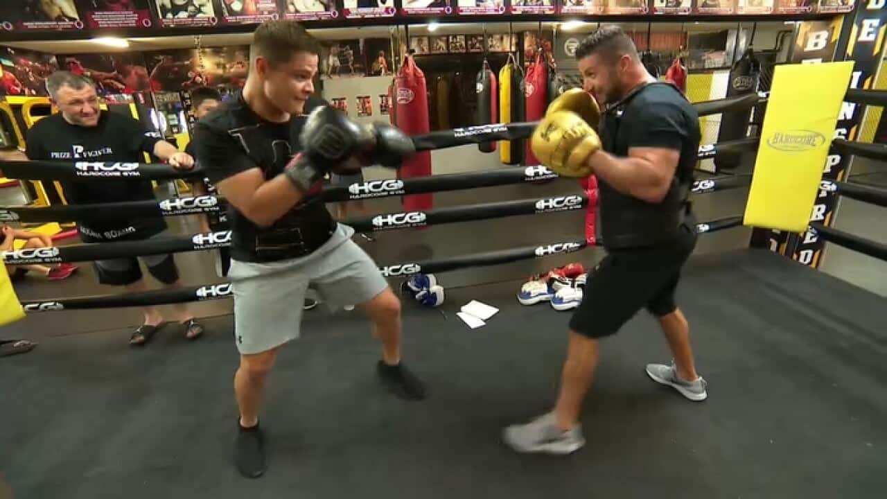Bilal Akkawy (left) in training