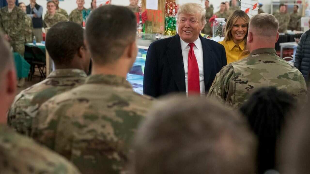 President Donald Trump and first lady Melania Trump visited members of the military at Al Asad Air Base over the Christmas break.